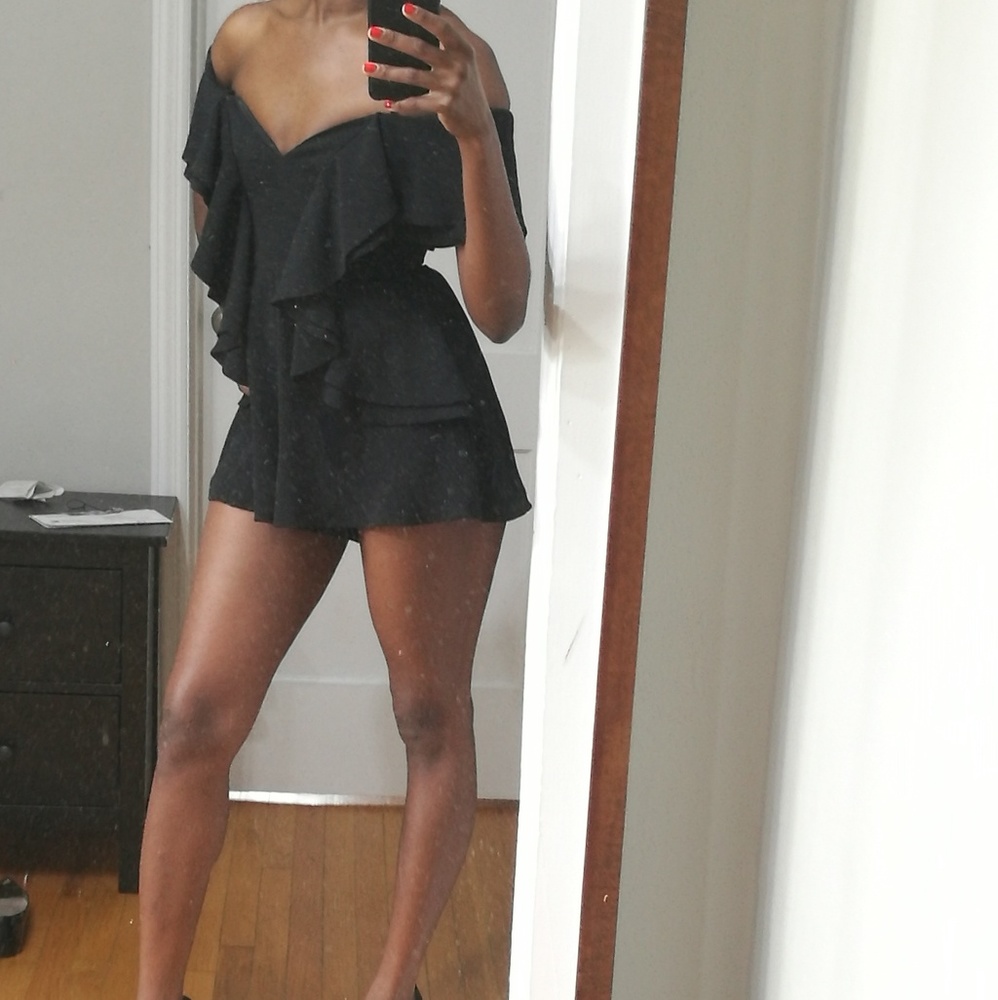 CMEO black romper with ruffles